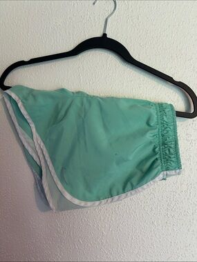 Nike Women's Mint Green Athletic Running Shorts with White Trim